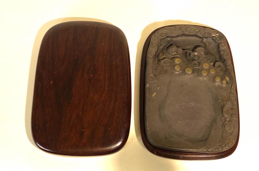 Chinese Duan Inkstone - Dragon: 20th cen, chinese duan inkstone of dragon and wave dÃ©cor, rosewood case, 7" by 10"