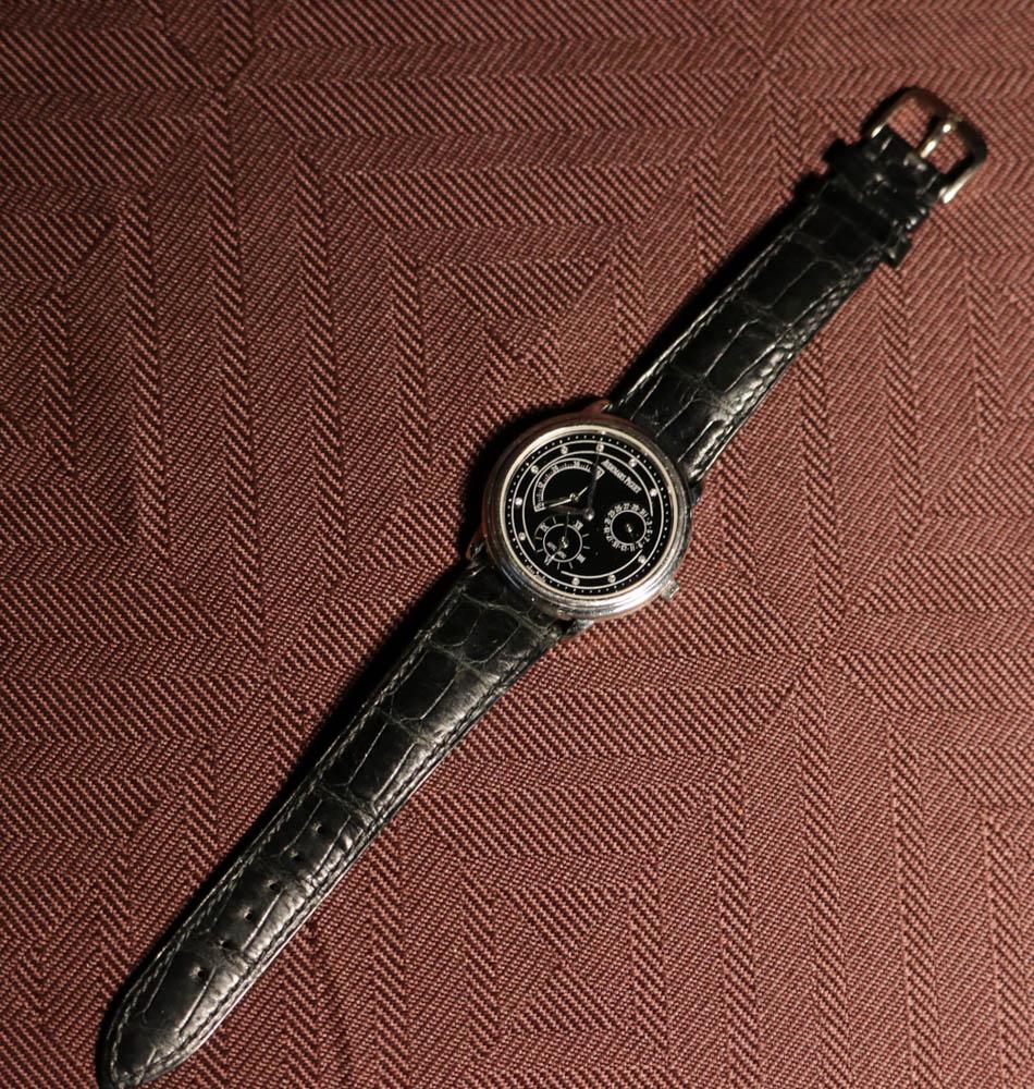 Audemars Piaget Platimun Automatic 48 hours Reserve: Provenace: Property of a Northeast Maine Estate; black enamled face with Diamond, measures 1.5" in diameter, wt 54 grams