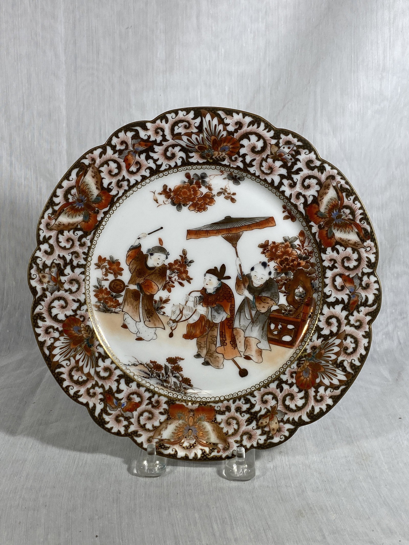 Japanese Kutani Porcelain Dish - Children on Horse: meiji period, fine japanese kutani porcelain dish of boys scene, 9"dia, artist signed