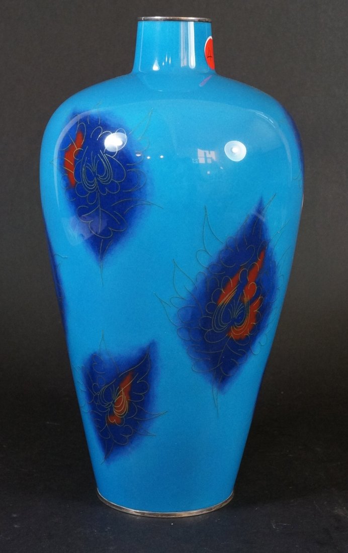 Japanese Art Deco Cloisonne Vase: Signed by Ando Jubei. Blue meiping shape. 20th century. Measures 13" in height .
