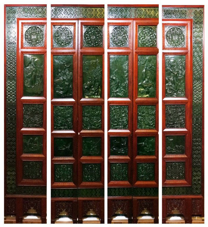 Massive Chinese Spinach Green Jade Floor Screen: Each panel is carved in relief of various scholars and beauties playing scene in a garden setting. Center jade panel is also carved with front faced dragon. Border of the screen is pierced carving of