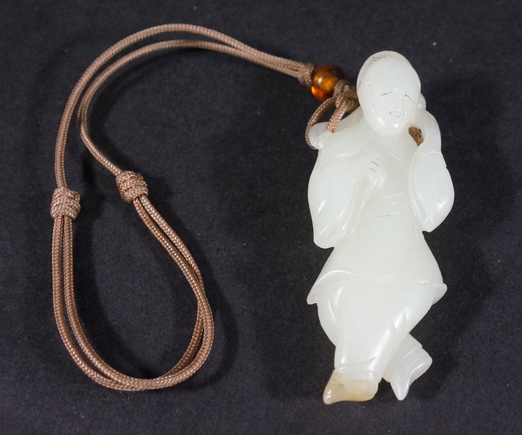 Chinese Carved Jade Beauty: Wearing lotus shoes with monkey on the back. 18/19th century. 2.5" L.