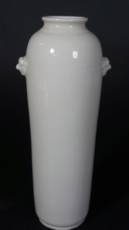 Chinese Blanc De Chine Porcelain Vase: Ivory white color with foolion mask on each side. 18th century. 8" H.