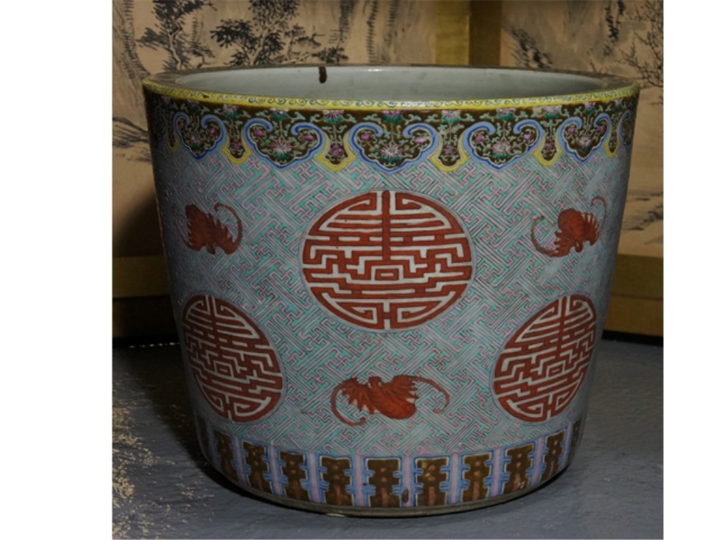 Chinese Famille Rose Porcelain Planter: Very large in size, bats and Shou characters motif. 19th century. Measures 19" in height and 20" in diameter.