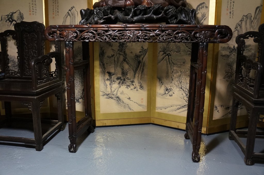 Chinese Rosewood Altar Table: Of grape and vine motif. 19th century. Measures 39" inlong, 39" in height and 15" in deep.