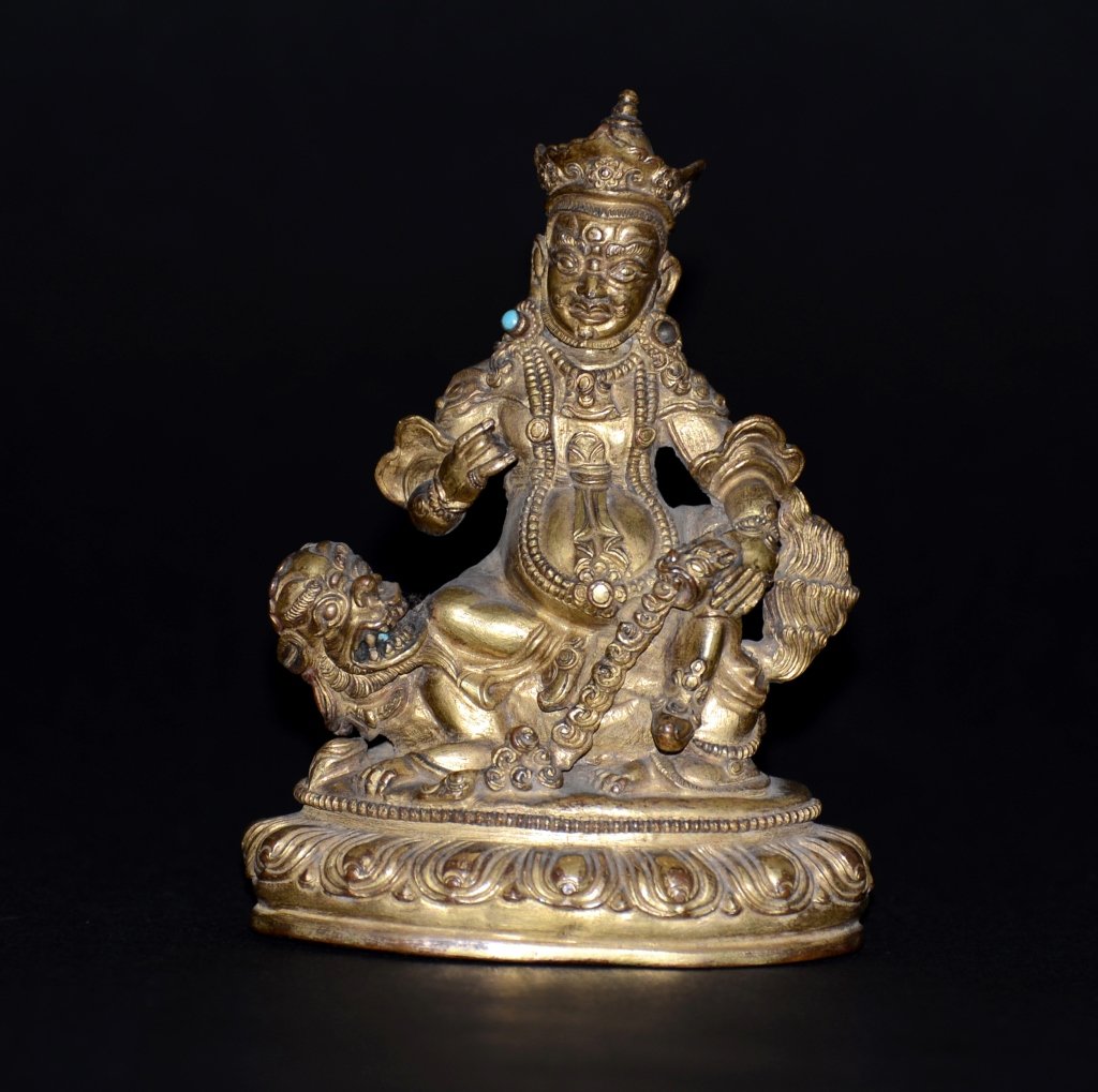 Sino-Tibetan Ming Gilt Bronze Jambala: 16th cen, Chinese Tibetan, seated on buddhist foolion and lotus base. Measures 5'h, 3.75'w