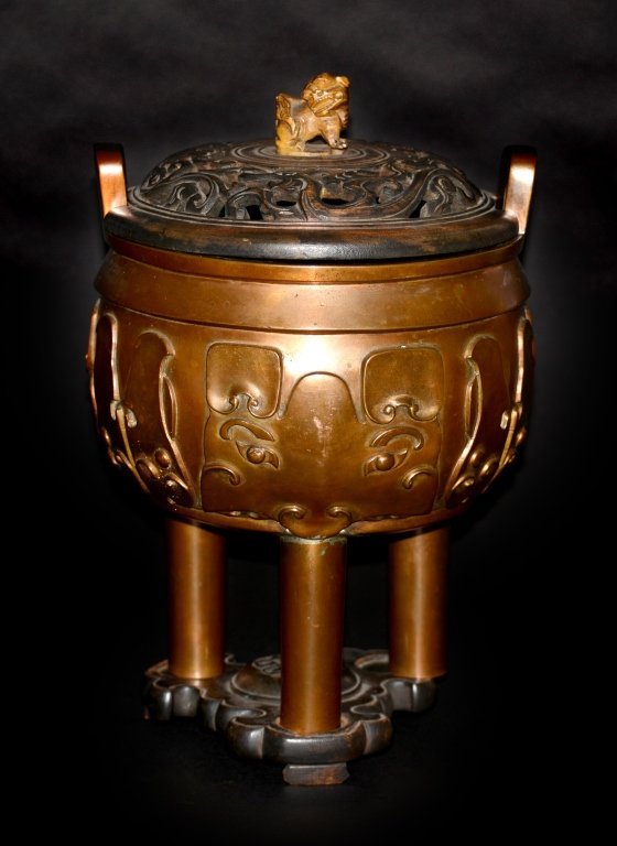 Large Chinese Bronze Ding Censer: 18/19th cen, Chinese censer with old wood cover and base, soapstone foolion finial. 14.5"h. Provenance: Private West Coast Collection