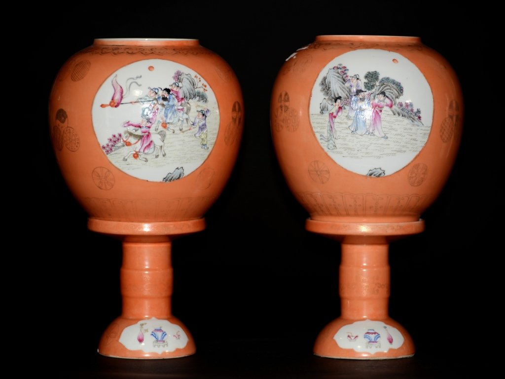 Pair Chinese Porcelain Marriage Lamps: Republic period, Chinese porcelain lamps with coral red glaze. Each with figural scenes of famille rose glaze in round reserve. Two parts consist of egg shell shade and stand. Measures 11.5"h.
