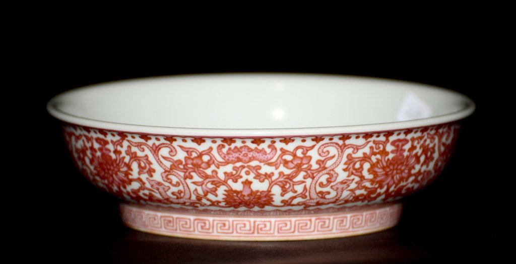 Chinese Republic Enameled Porcelain Dish: Chinese porcelain dish with ruby color enameled decoration of bat motif, underglazed blue enamel mark. Republic period, Measures 6.5" dia, From a New Hampshire Collection.