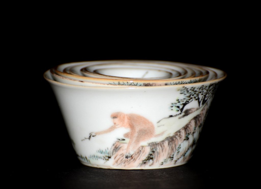 Set of Chinese Porcelain Nesting Cups: 19th cen Chinese porcelain cups of unusual subject mater of monkey, floral, insects with poem. Signed by the artist. Measures 3.5"dia, 1.5"h