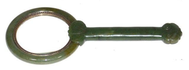 Chinese Spinach Jade Magnifier: 20th cen Chinese spinach jade magnifier, well made with a ruyi head motif at the end and a jadeite handle holding the lens, measures 8" long