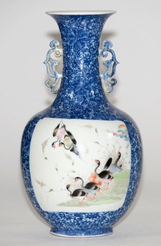 Chinese Blue White Porcelain Vase: Chinese blue white porcelain vase of Republic period, with famille rose decoration of goose scene in reserve against an underglazed blue Buddhist lotus motif ground. Measures 12"h