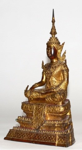 Thai Gold Lacquered Bronze Buddha: Thai gold lacquered bronze Buddha of seated form on altar base. 13.5"h
