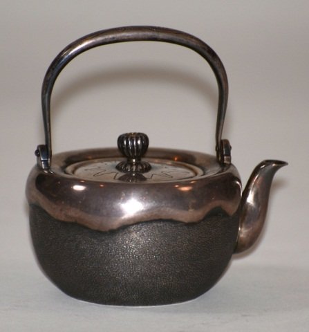 Japanese Silver Teapot: Flattened round shape with snow overflow decoration on matte surface, signed. Meji period, 19th cen, 3.5" by 3.5" Please visit our website http://stallionhillgallery.com/ to see the high resolution ph