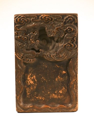 Chinese Scholar Inkstone: of terracotta chen-ni clay carved with dragon motif, 19th cen, measures 8" by 5" by 1.2" Please visit our website http://stallionhillgallery.com/ to see the high resolution photos. Thanks! 欲