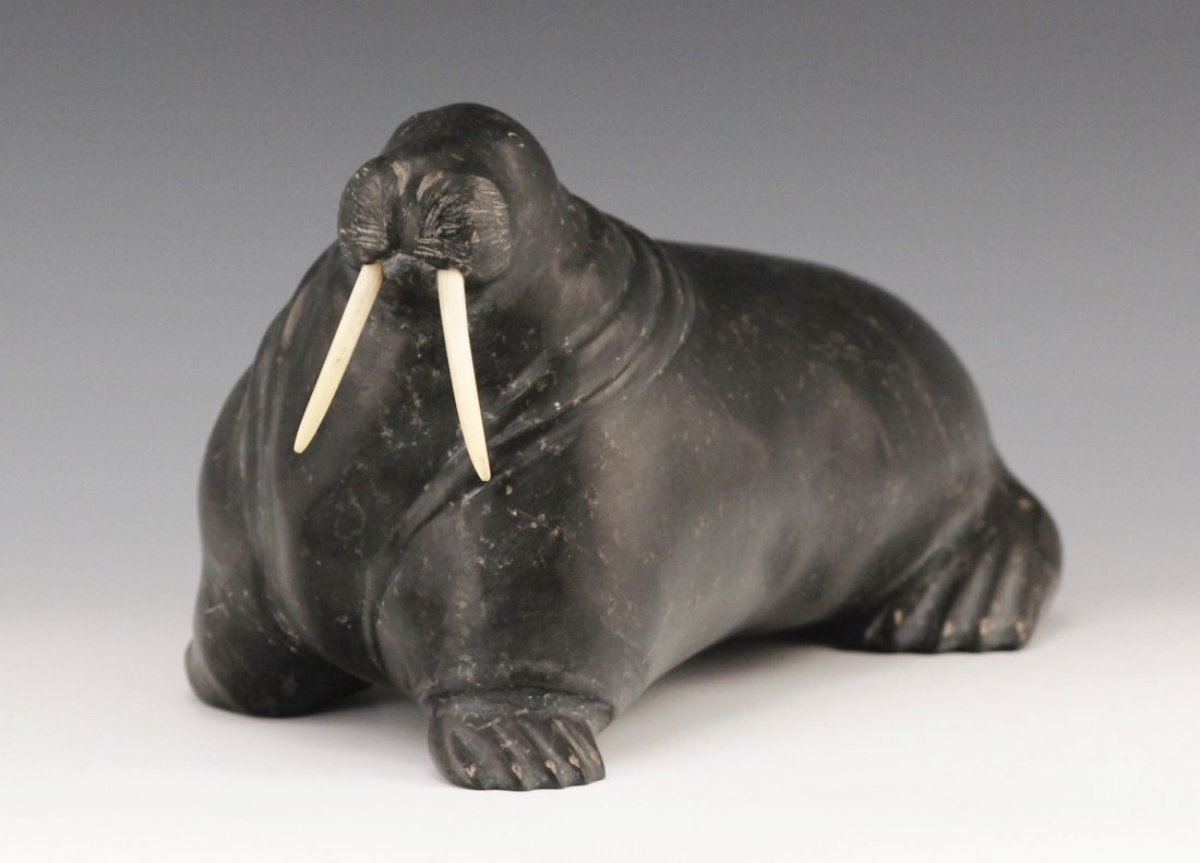 Vintage Native Alaskan Inuit Eskimo Seal Sculpture: Green soapstone carved vintage sculpture of walrus by Alaskan Inuit Native signed Joe E_9_1595 with Whale Bone tusks Size - 6" x 10 x 6"