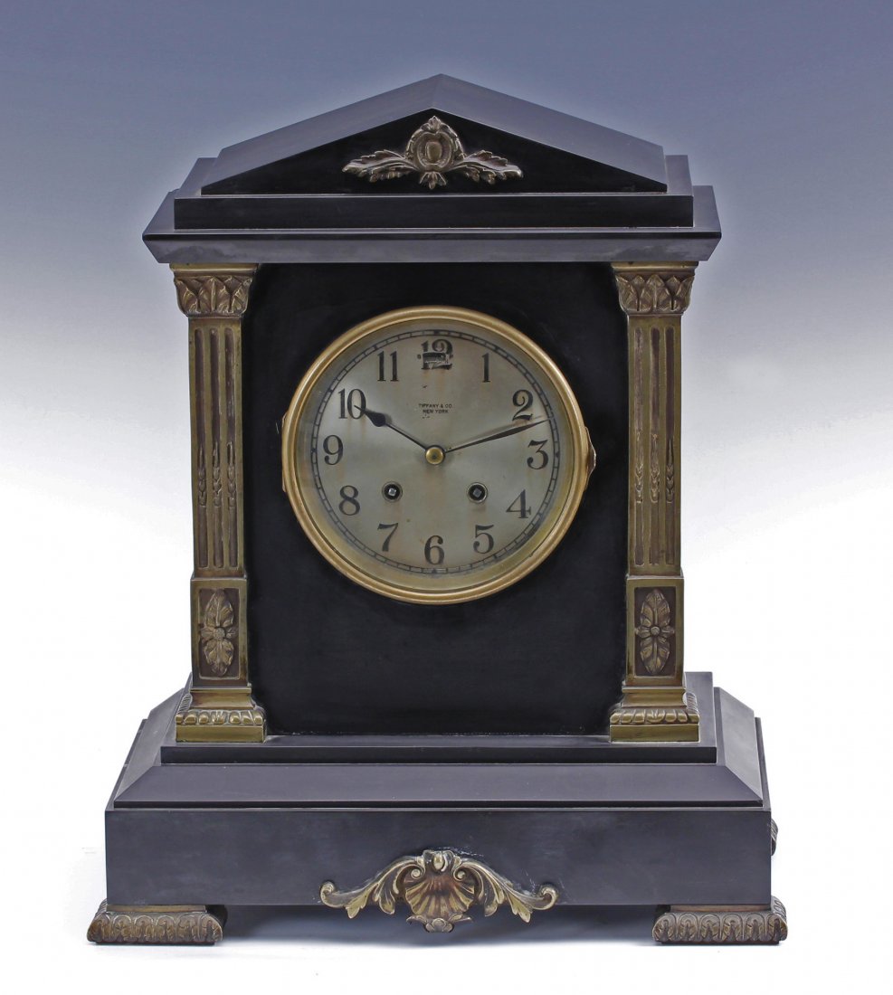 Tiffany & Co Chelsea Footed Ormolu Mantle Clock: Tiffany & Co. Onyx Footed Ormolu Pediment top mantle clock with gilt columned sides Chelsea Size - 16 1/2" x 13 1/4" x7 1/2"