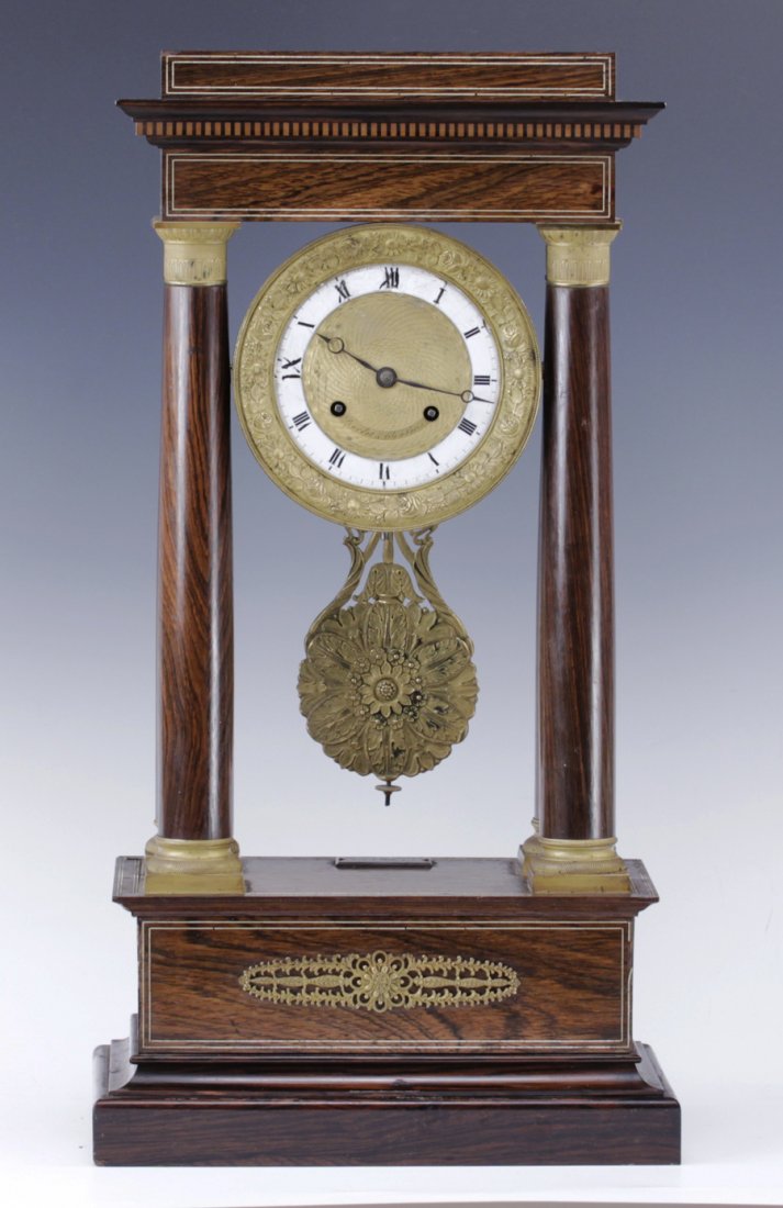 French Empire Antique Bardot Mantle Clock Ornate Ormolu: Marked Bardot on movement Ornate Ormolu pendulum & Ionic Column supports Mahogany veneer casing Degress du Gerdee on plaque Bardot de Vils en Paris on dial on base Size - 23" x 7 1/4" x 12 1/4"