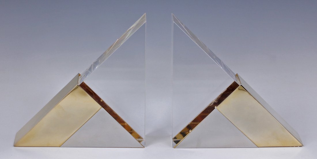 Pair Attrib Paul Evans Lucite Chrome Mid Cent Bookends: Attributed to Paul Evans Lucite & Chrome Pair Bookends Mid Century Triangle bookends with three sectioned gold, chrome and clear Lucite pieces Size - 6 3/4" X 6 3/4" x 2"