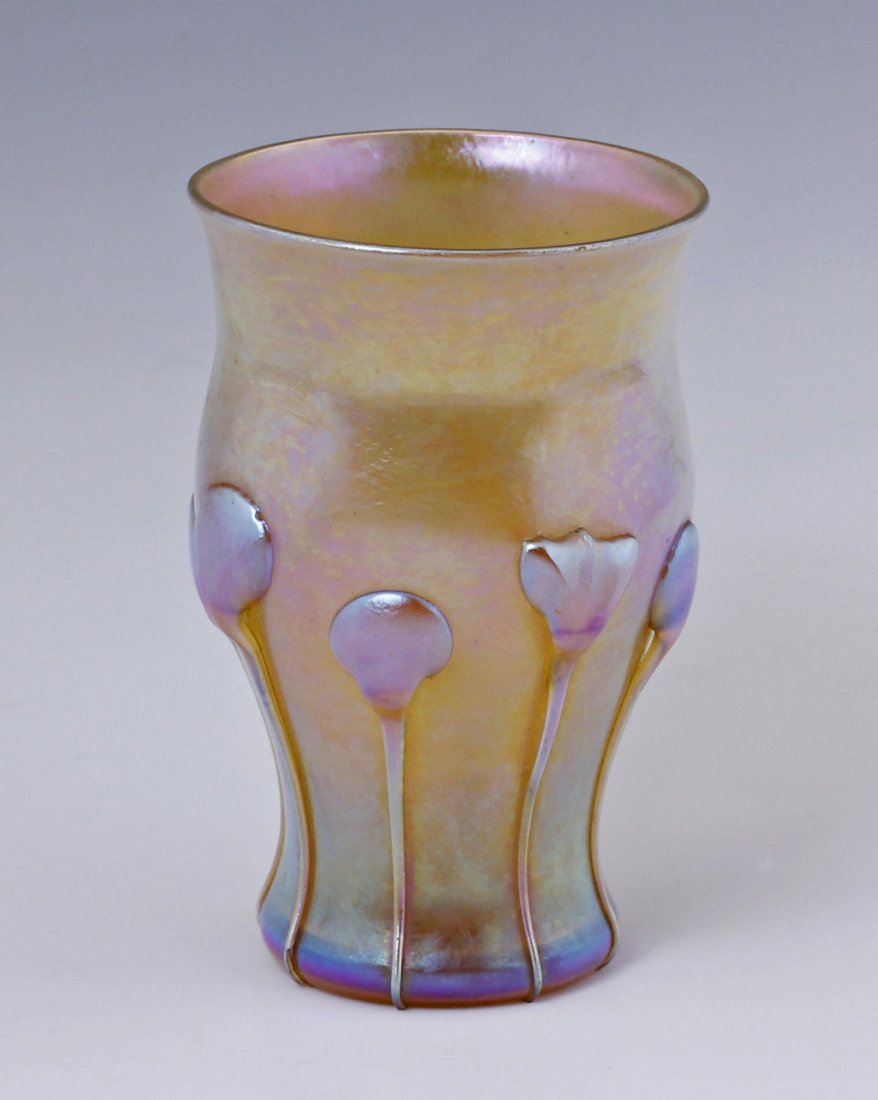 Tiffany Studios Favrile Art Glass Vase Applied Florals: Tiffany Studios Favrile Art Glass with original label and applied stylized floral decorations over an opalescent body Size - 3 3/4" h s 2 3/8" diameter top x 1 3/4" diameter bottom acid etched on bott
