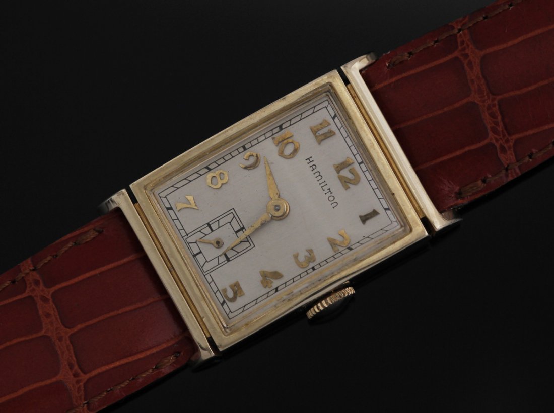 Hamilton 14kt Gilbert Tank Circa 1940s Watch: Art Deco Hamilton 14kt Gold Gilbert Tank Circa 1947 Gentlemen's wristwatch sub second dial Arabic numeral markers Size - 22.5 width including crown 34mm lug to lug 9mm thick 18mm between lugs