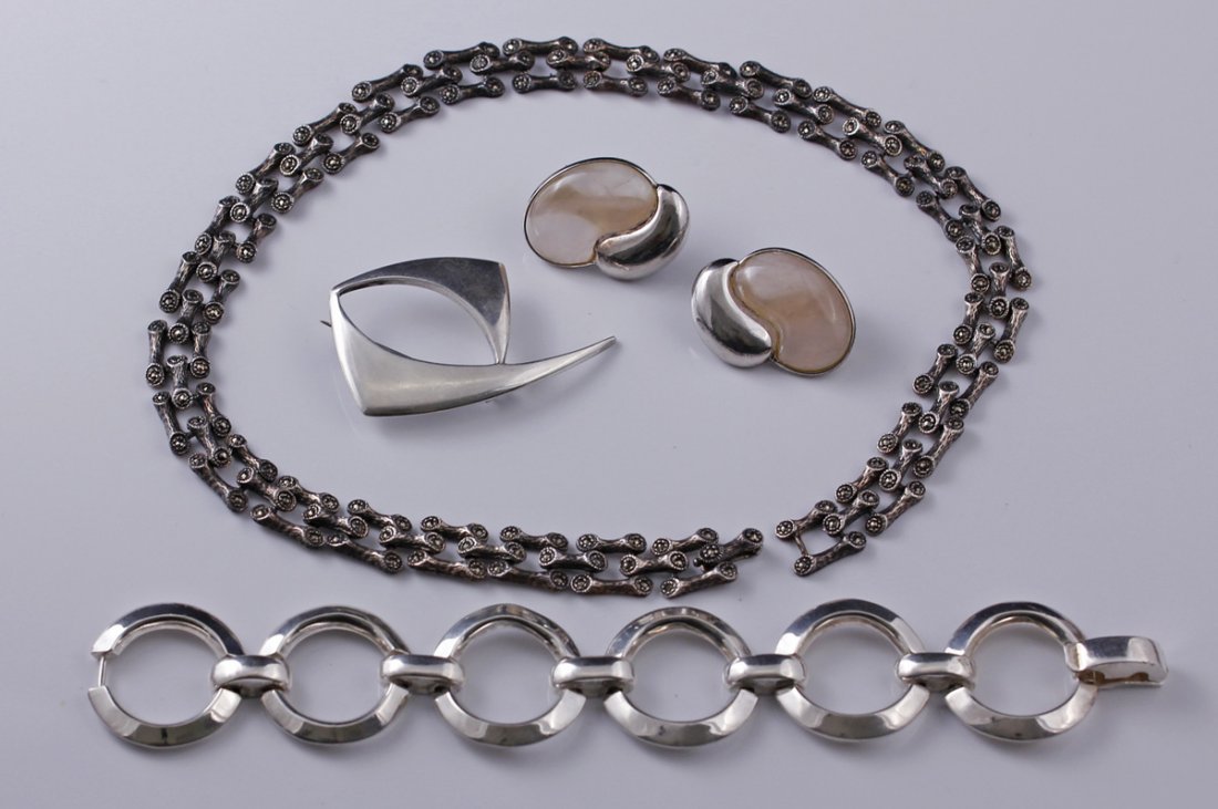 Lot Sterling Mid Century Modernist Jewelry Norway: Includes Kylo Kai Yin Lo Rose Quartz bean shaped large earrings, Versa Circle link bracelet, marcasite "bone" link necklace, Noway J. Tostrup "boomerang" pin total weight - 5.9 oz/167.1 grams Sizes - 