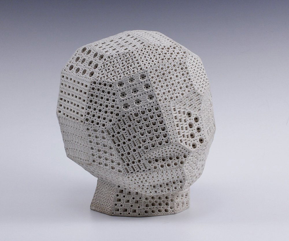 Alexander Ney (B 1939) Russian Cubist Head Sculpture: Vintage intricate head sculpture in matte glazed white terra cotta by Russian artist Alexander Ney with Cubist overtones linear planes/fields with pierce work signed in three areas "A Ney" Size - appr