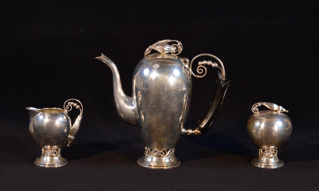 Japanese Art Nouveau Silver Tea set: after the jensen style, 20th cen, stamped Hirata and Co. 7.5"h 8.5"w.