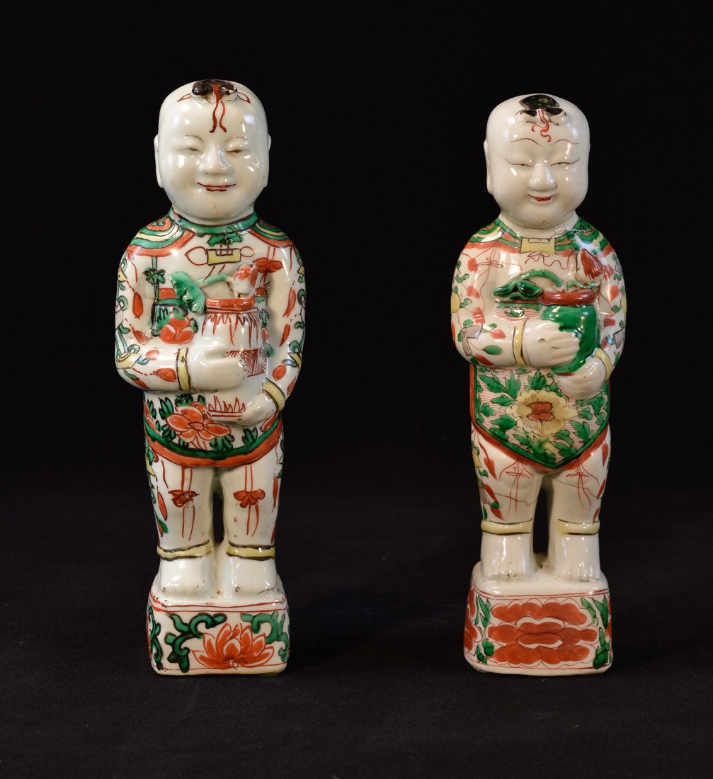 Pair Chinese Wucai Porcelain Boy: Qing period, measures 11.5"h 3.8"w, Provenance: Estate of Alfred Guntermann, New Haven, Ct