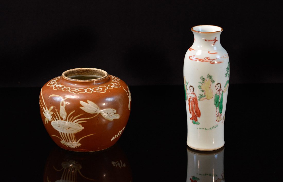 Group of Two Chinese Porcelain Articles: one soy glazed with white decoration, another wucai vase, booth has damage, measures 8"h 4"w and 5"h 4"w Provenance: Estate of Alfred Guntermann, New Haven, Ct 8"h 4"w and 5"h 4"w
