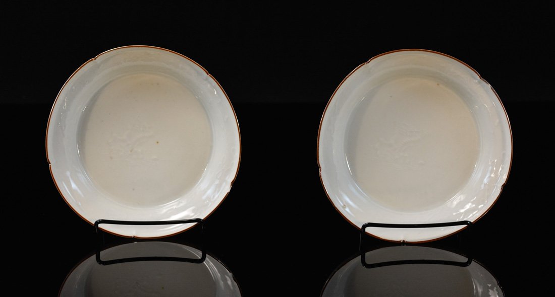 Pair of Japanese Kakemono Lobbed Porcelain Dishes: 19th can or earlier, floral motif, one has small chip, measures 2"h 6.5"w Provenance: Estate of Alfred Guntermann, New Haven, Ct