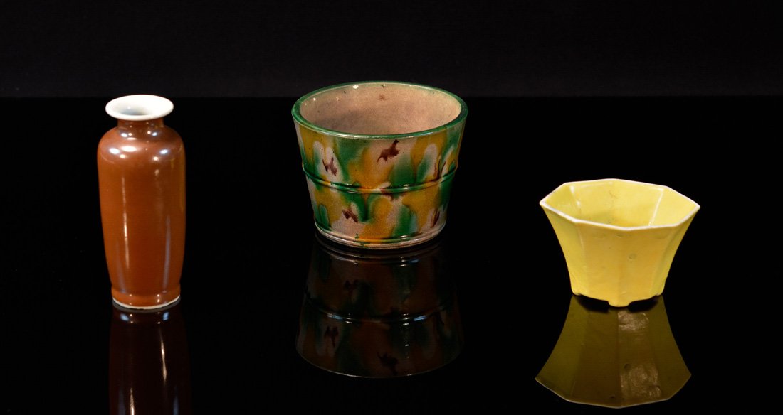 Group of Three Chinese Monochrome Porcelain Articles: one sancai glaze, one soy glazed vase, one yellow glazed cup,19th cen or earlier, largest measures 4"h 4.5"w, 2"h 3.5"w and 5"h 1.75"w Provenance: Estate of Alfred Guntermann, New Haven, Ct