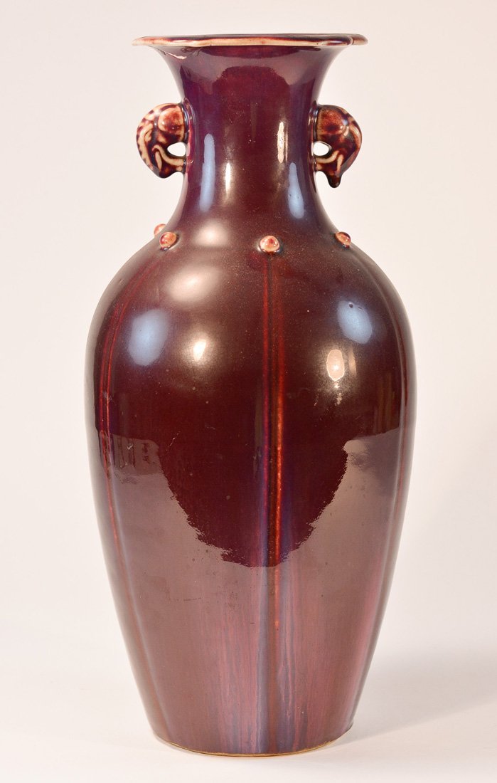 Chinese Flambe Porcelain Vase with Elephant Ear: rim chip, 19th cen, measures 17.5"h 7"x6"w Provenance: Estate of Alfred Guntermann, New Haven, Ct