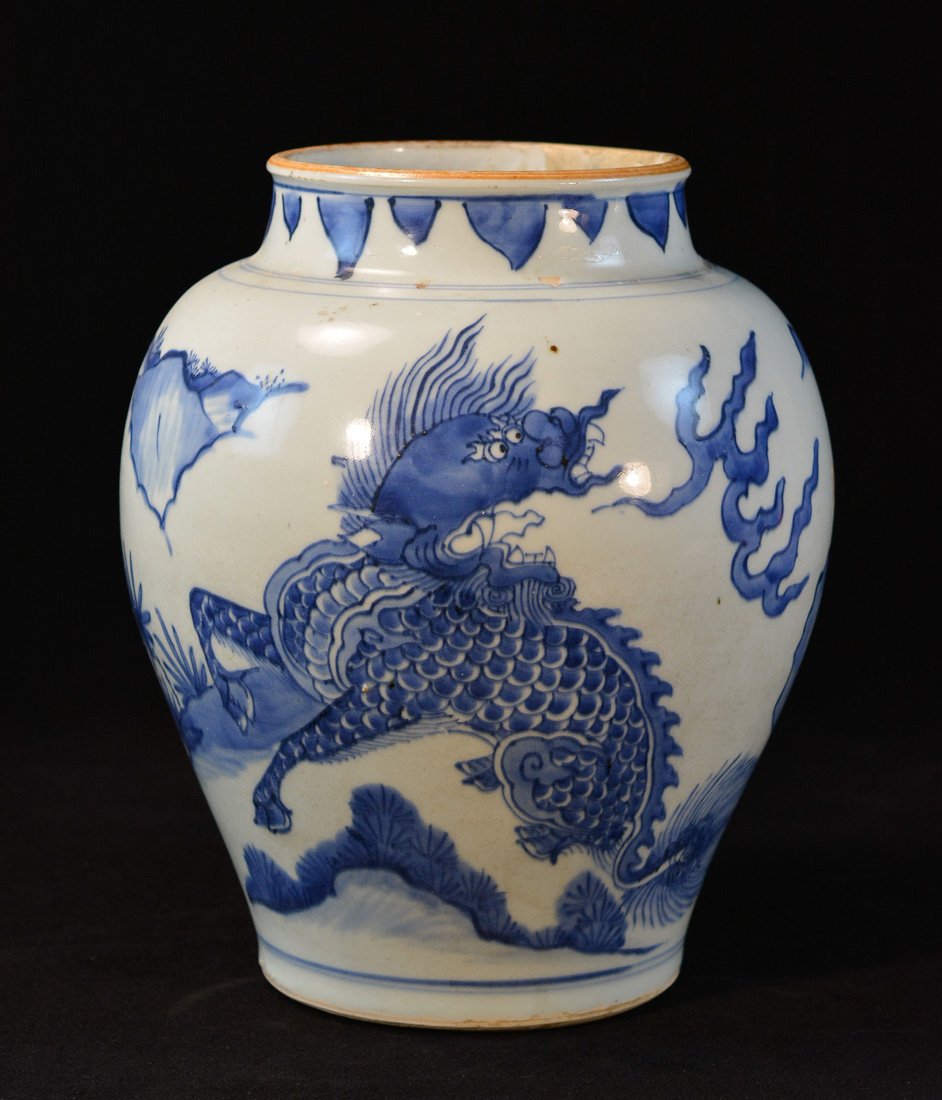 Chinese Blue White Porcelain Blauster Jar - Kirin Motif: hairline, measures 12"h 6"dia Provenance: Estate of Alfred Guntermann, New Haven, Ct