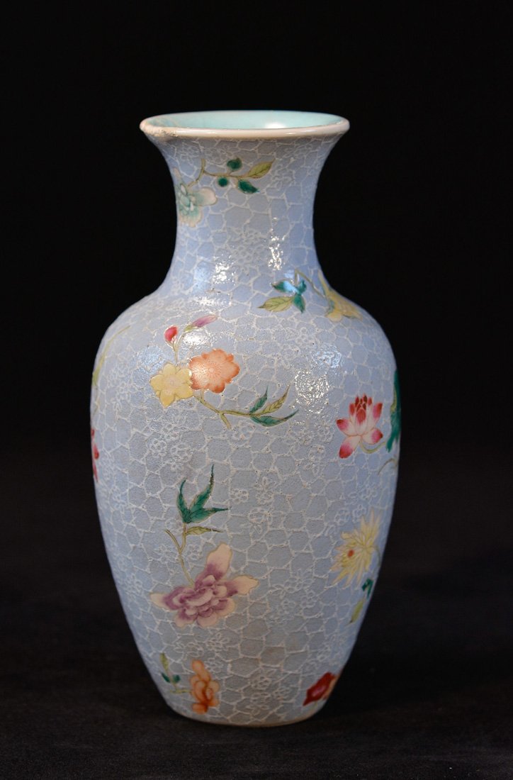 Chinese Republic Period Famille Rose Porcelain Vase: floral motif over blue enameled ground, measures 7"h 2.5"w Provenance: Estate of Alfred Guntermann, New Haven, Ct