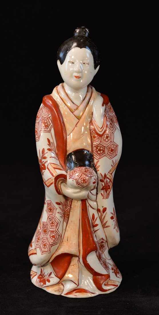 Japanese Porcelain Figurine: 19th cen, measures 10"h 3.5"w Provenance: Estate of Alfred Guntermann, New Haven, Ct