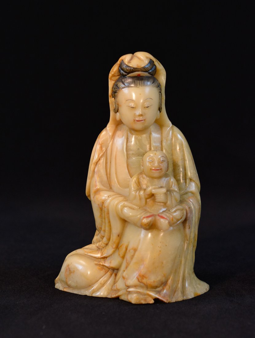 Chinese Soapstone Carving of Kuanyin with Boy: 19th cen, measures 5.75″h 3″wfoot chipEstimate $1,000-$1,500