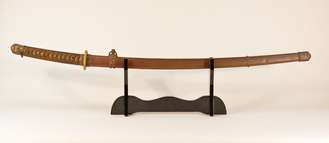 Japanese Katana Sword: mounted in 20th cen military style, blades much older, with brass tsuba, measures 39"l