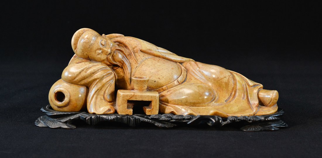Chinese Carved Soapstone Drunken Scholar with Hardwood: 19th cen, measures 3.5"h 11"w .
