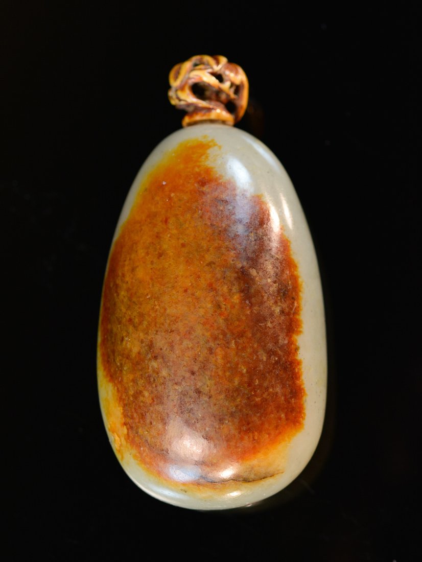 Chinese Pebble Jade Snuff Bottle with Brown Skin: 19th cen, measures 3.25"h 1.5"w; Provenace: Lizzado Collection .