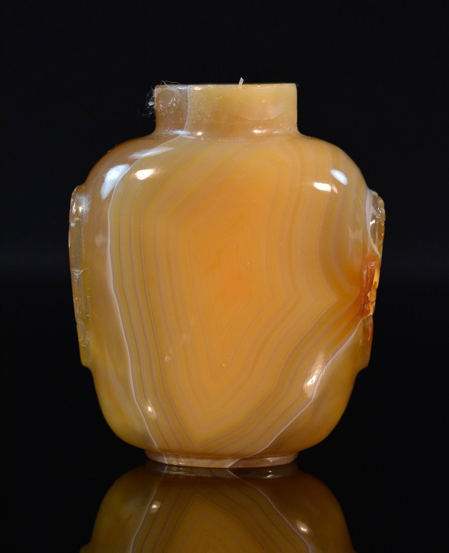 Larger Chinese Agate Snuff Bottle with Foolion Mask: 19th cen, measures 3" by 2.5" .