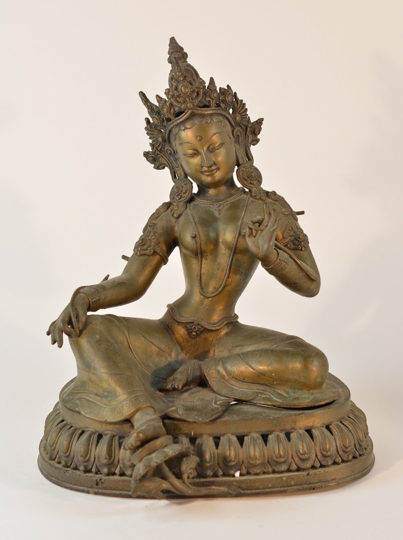 Nepalese Bronze Seated Tara with Hand Up: 19th cen, measures 13"h 10.5"w 7"d .