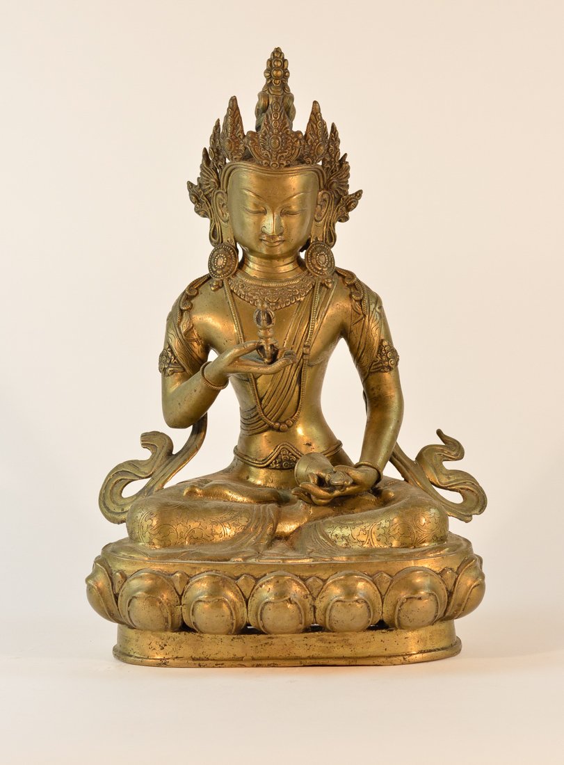 Nepalese Bronze Seated Tara with Bell: 19th cen, measures 16"h 9.5"w 7"d .