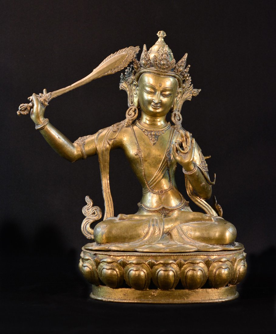 Nepalese Bronze Seated Tara with Sword: 19th cen or earlier, two part casting , measures 16"h 13"w