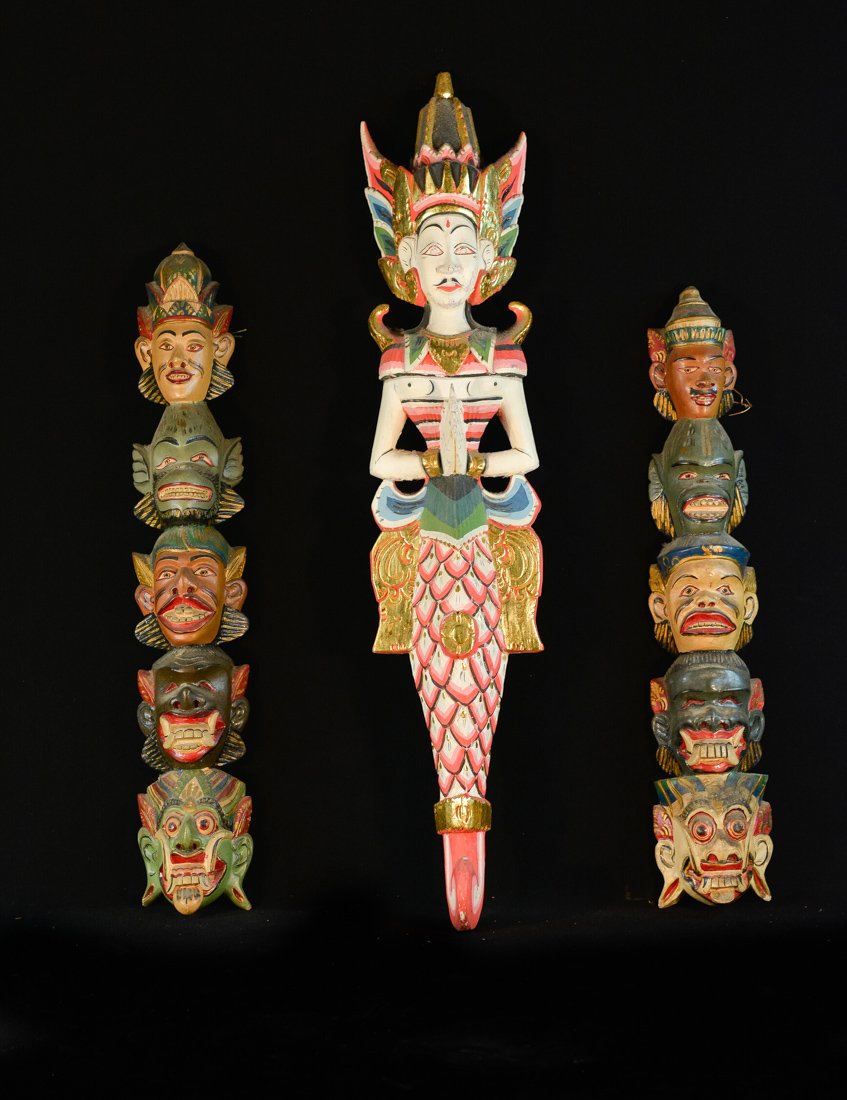 Group of Three Southeast Asia Wood Mask Post: 20th cen, one measures 28"h 6"w, the other two measure 20"h 4"w; Provenance: from an Manhattan Gentleman Life Time Collection