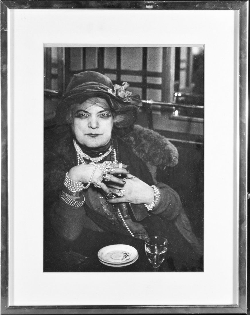 Gyula Brassai Black & White Gelatin Silver Photograph: Madame Bijou in the Bar de la Lune Paris 1932, Pencil signed verso, Numbered PP. 384 verso, Copyright stamp verso, measures 15"h 12.75"w, frame measures 21"h 16.5"w