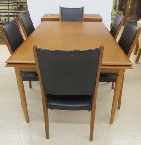 Mid Century Svegards Dining Room Table and Chairs: Danish Modern Svegands Dining Room Table and Chairs Table is 62" Long Closed 97" Fully Opened and 40" Wide. Chairs are 38" high and 18" wide