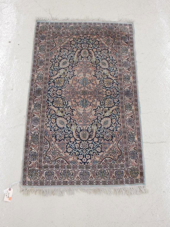 Antique silk rug: Antique silk collectors rug. Quite old, tight weave, floral ground with peacocks. Not sure if Persian, likely Turkish. There is no rot we doubt if any wear as it is completely even. It would seem to b