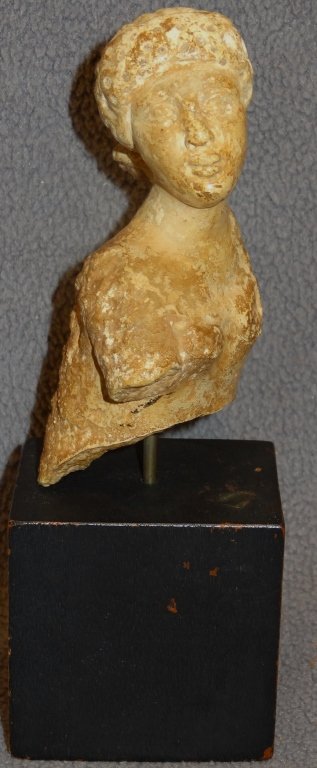 Ancient Provincial Greek carved stone: Ancient Provincial Greek carved stone, apparently a fragmentary Gypsum sculpture. The upper torso of a rendition of Venus. Drill work in the hair. It seems without restoration, considerable burial sur