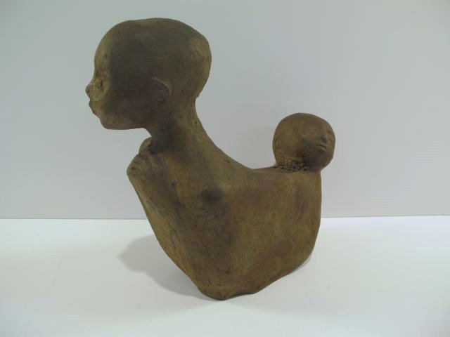 Hugo Robus mother-child sculpture: Hugo Robus 1885-1964 American sculpture/painter, mother-child. According to the internet, he worked in clay, plaster, silver and bronze sculptures and oil paintings. This piece represents a mother and